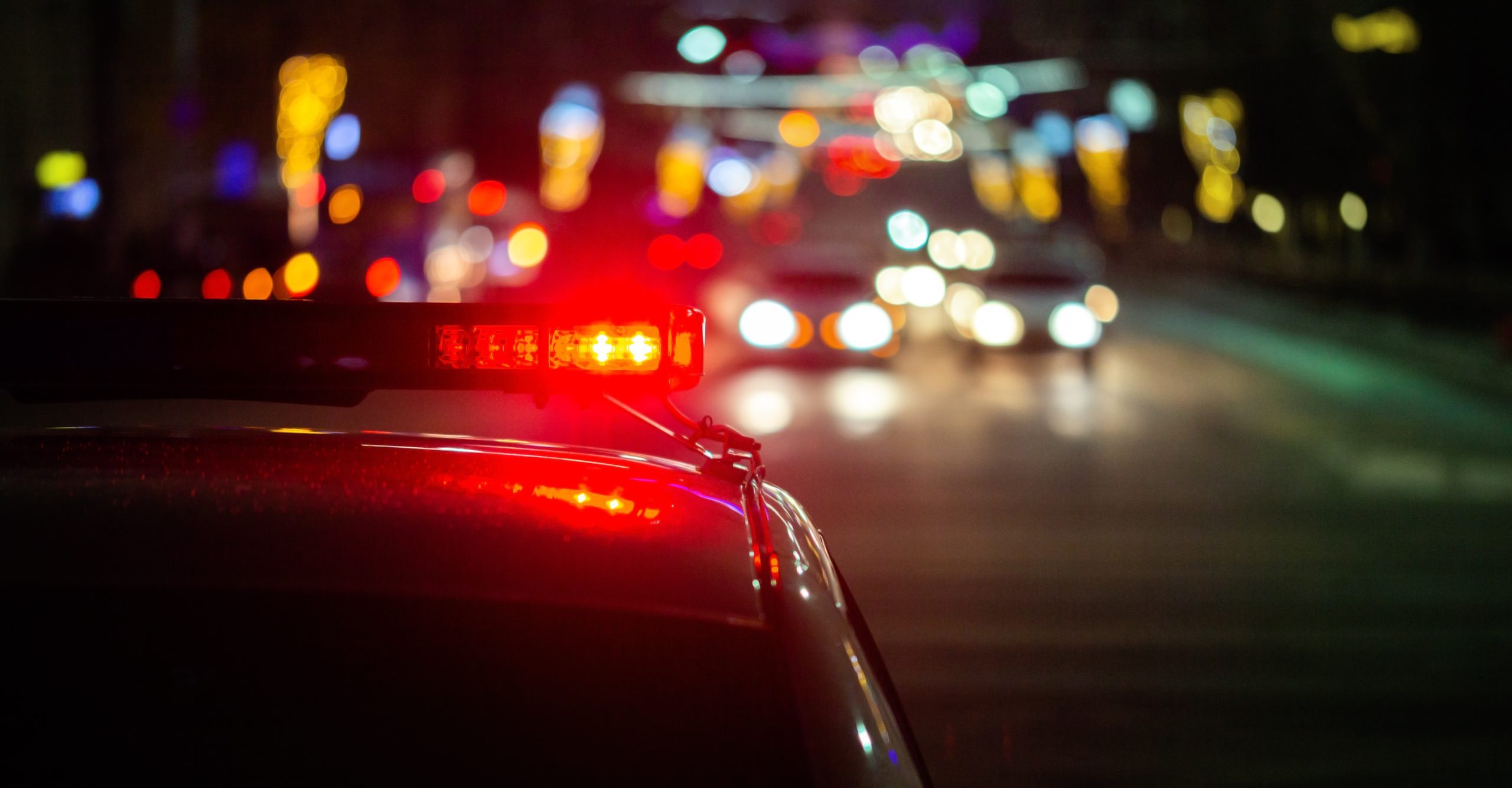 Police car lights at drunk crash